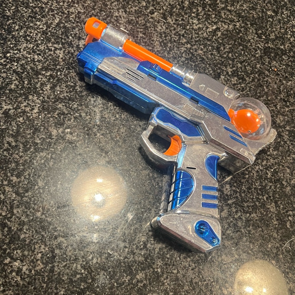 Space Blaster Toy Gun - Silver, Blue, and Orange. Super fun.